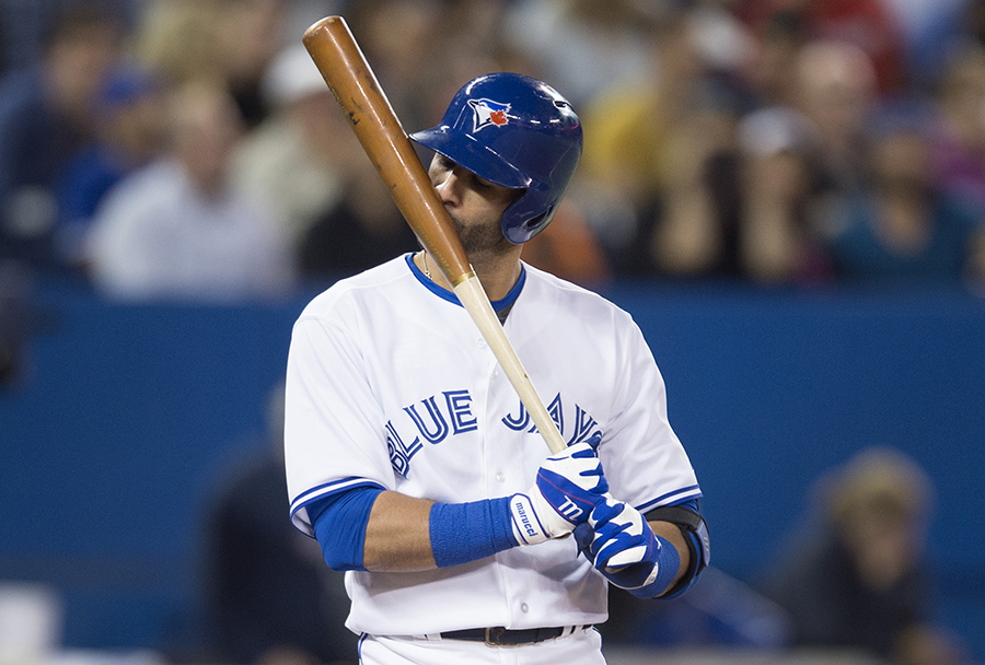 Toronto Blue Jays' Jose Bautista kisses his bat while in the batter's box in the fourth inning of MLB baseball action against the Baltimore Orioles in Toronto.